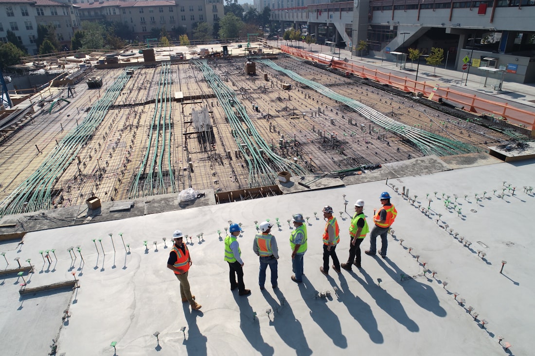 AU Equipments crew reviewing a jobsite